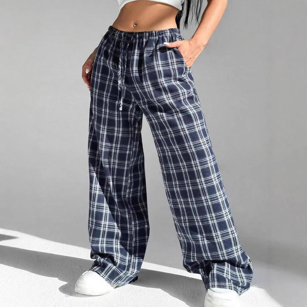 Women's plaid trousers with drawstring waist and front pockets in red colour