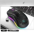 Wireless gaming mouse with hollow-out illuminated design in cyan colour showing ergonomic shape