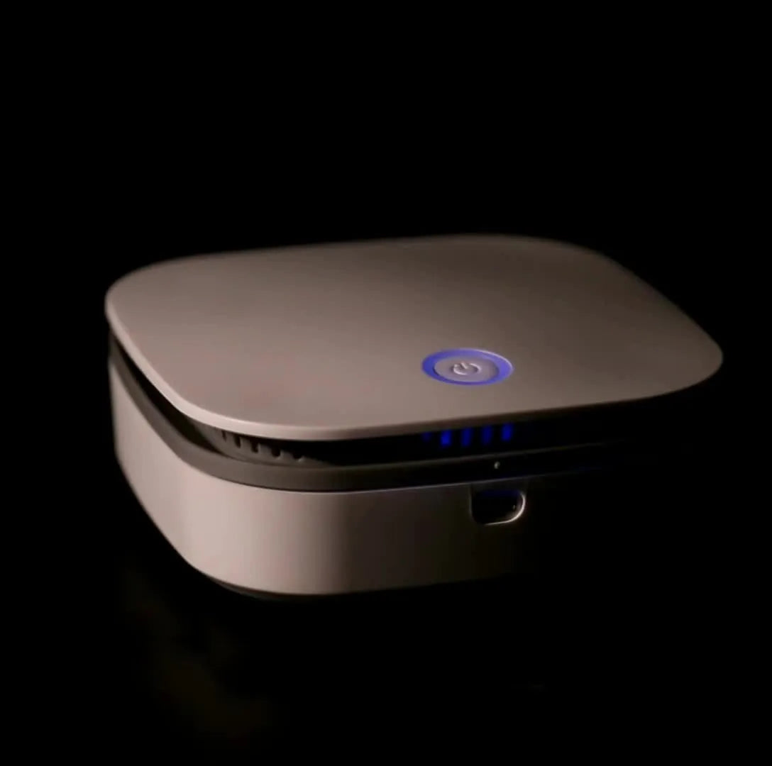 White car air purifier with USB cable and button controls for negative ion sterilisation