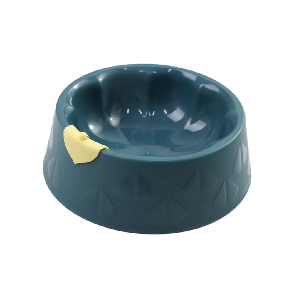 Green plastic anti-tipping pet bowl for dog and cat food and water.