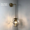 Modern glass bedside wall lamp in Golden Flower finish with LED lighting, 20cm size