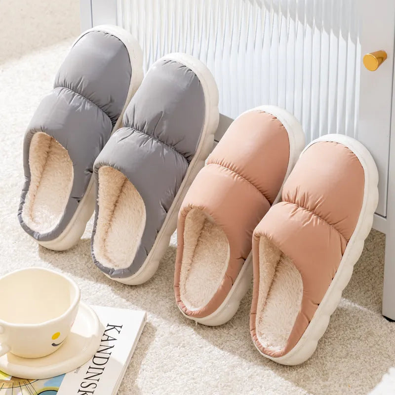 Down cotton slippers with artificial leather upper, rubber sole and plush lining in multiple colours