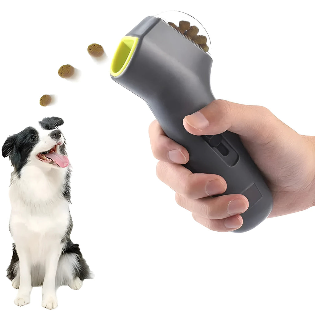 Grey plastic pet snack catapult launcher toy with a handle for dogs and cats.