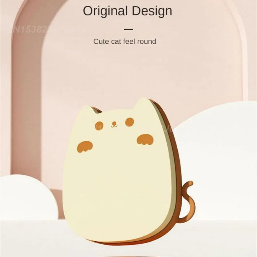 Brown sponge silicone pet grooming brush with dual-texture comb teeth on white background