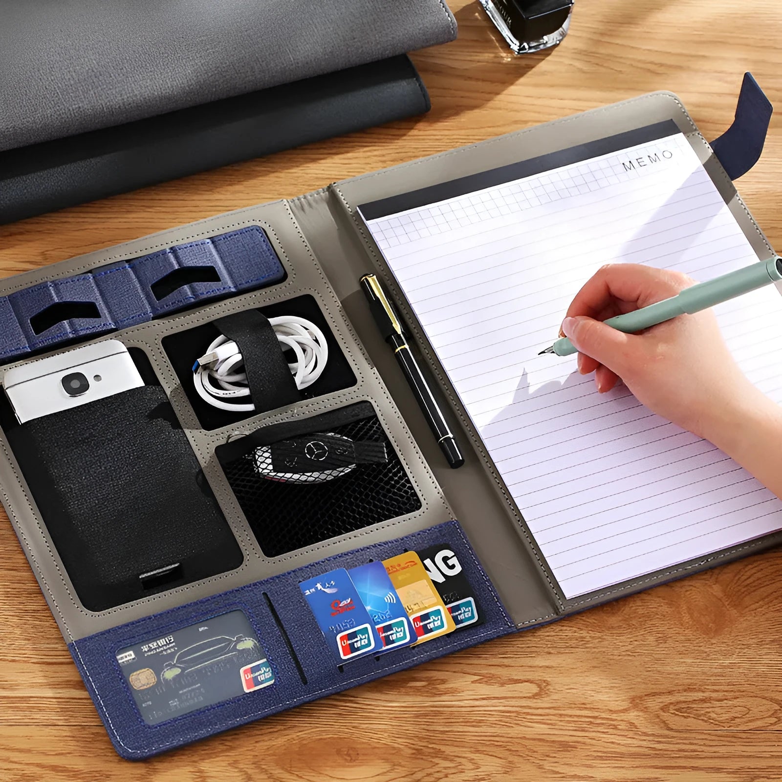 Black leather A4 business folder with pen holder and notepad for document organisation