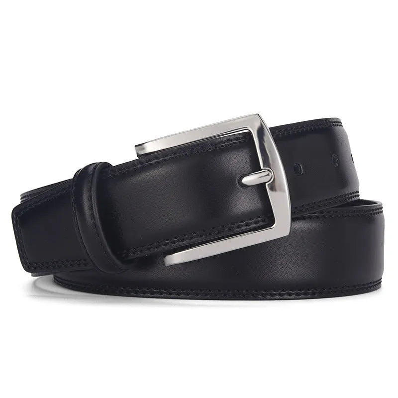 Men's classic black patent leather belt with a silver pin buckle on a flat surface.