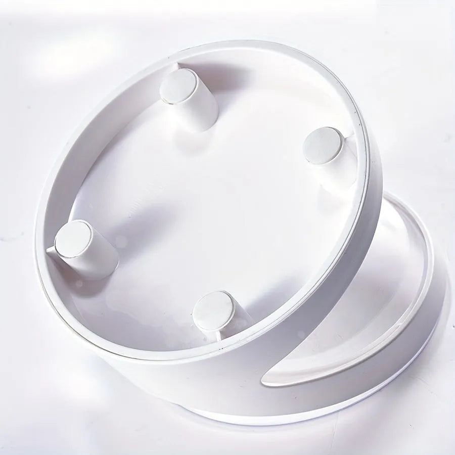 White elevated plastic cat food bowl with clear dish on a tilted stand