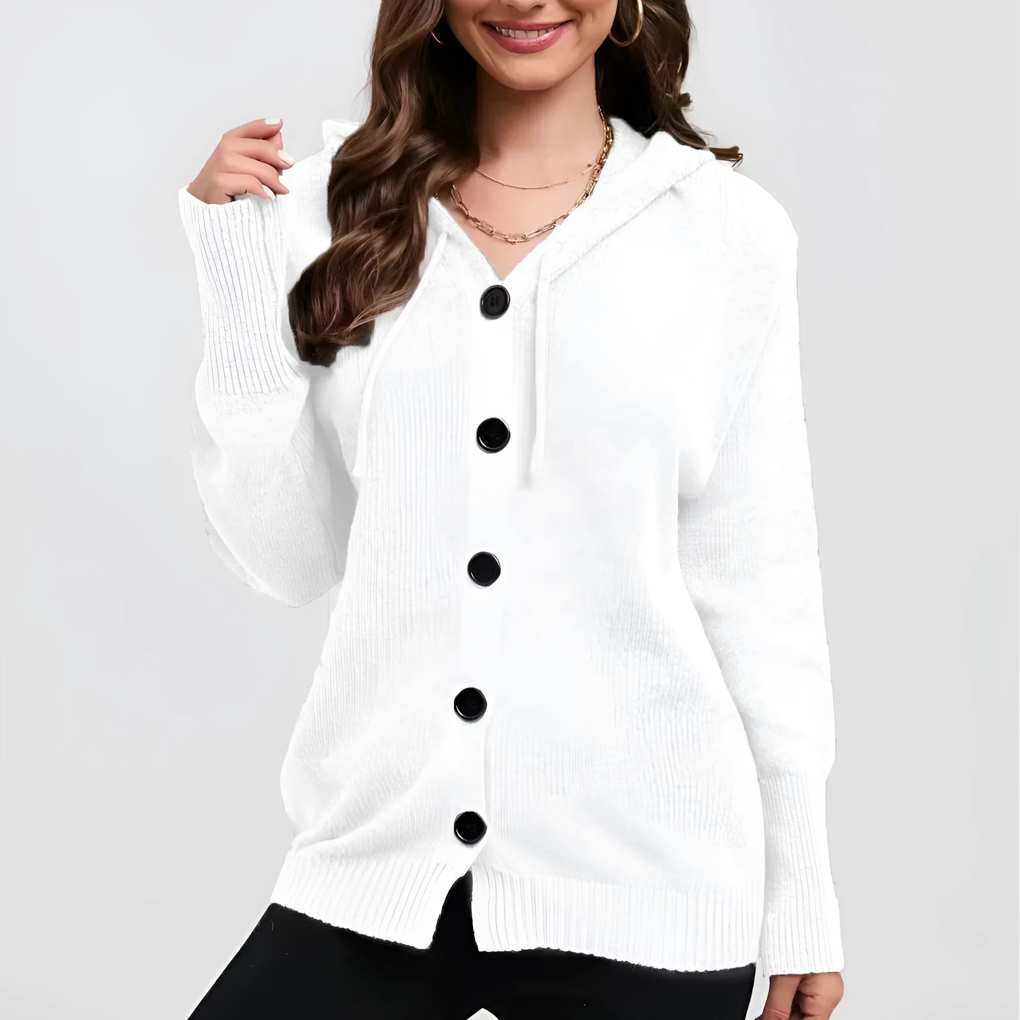 Women's loose hooded cotton sweater in a solid colour with a textured 3D pattern, shown as a cardigan.