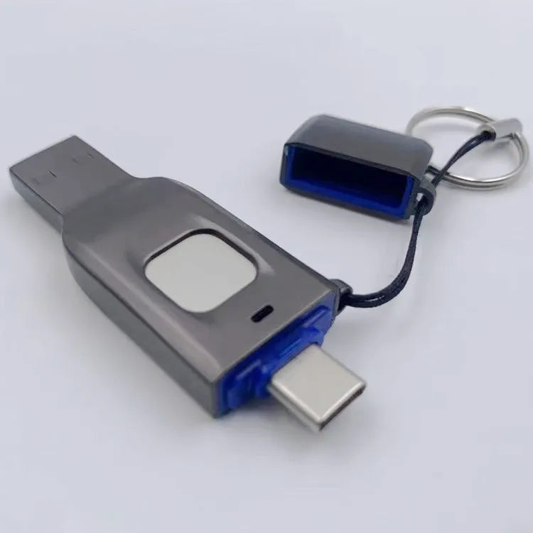 Black encrypted USB flash drive with fingerprint sensor showing USB 3.0 and USB-C connectors