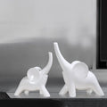 Modern resin elephant ornament figurine in rose gold or white colour with contemporary design
