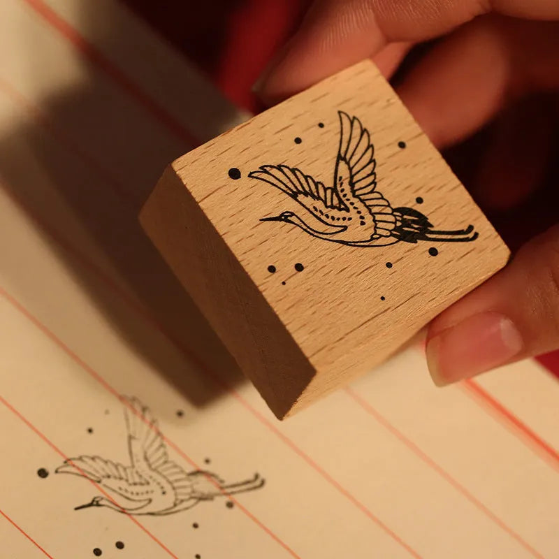 Mr. Paper wooden seal set with traditional crane designs in four colour variations for DIY printing projects