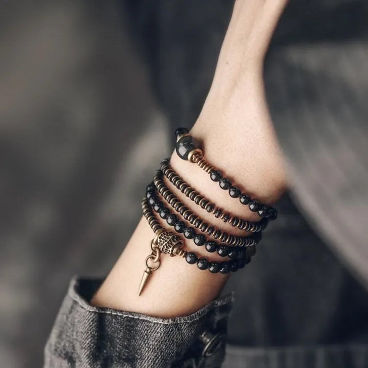 Geometric black stone beaded bracelet with multi-layered retro design