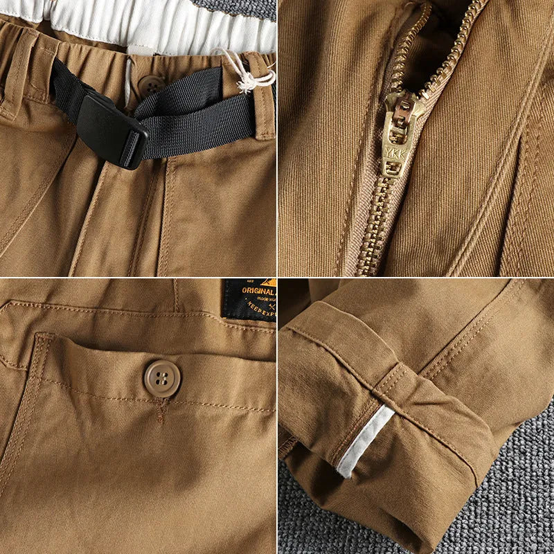 Men's khaki and dark blue cotton work trousers with mid waist and zipper fly on a size chart