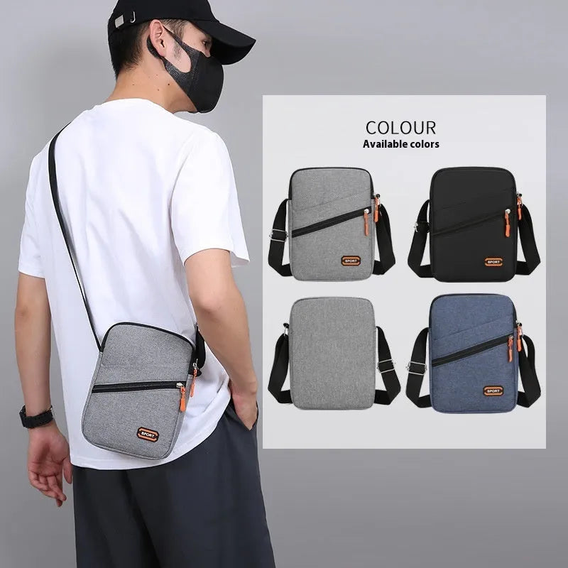Lightweight Oxford cloth crossbody commuter bag in a solid colour with contrast detail.