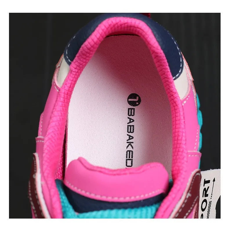 Pair of thick-soled leather sports casual shoes with wedge heels and front lace-up fastening.