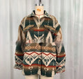 Women's loose-fit retro wool coat with blue Aztec print, long sleeves, and a tailored collar.