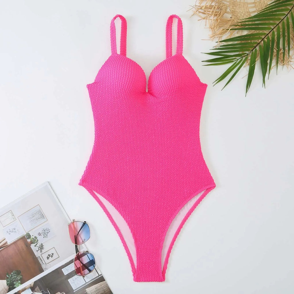 Women's black one-piece swimsuit with a sunken white stripe pattern across the front, sleeveless design.
