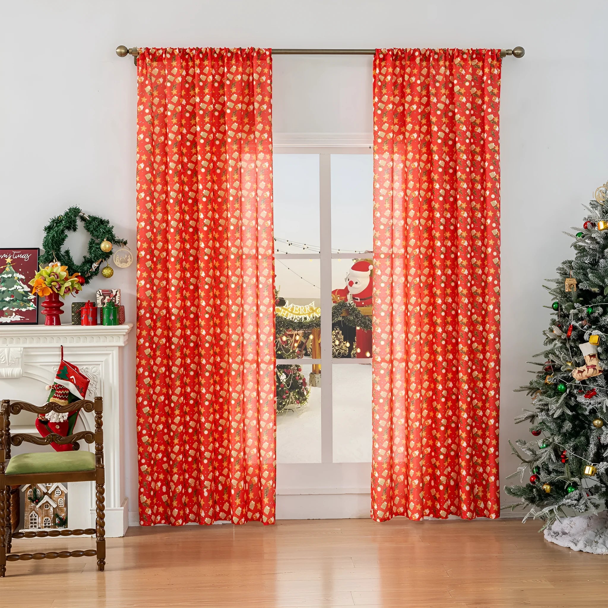 Green festive curtain with printed cartoon snowman and angel pattern.