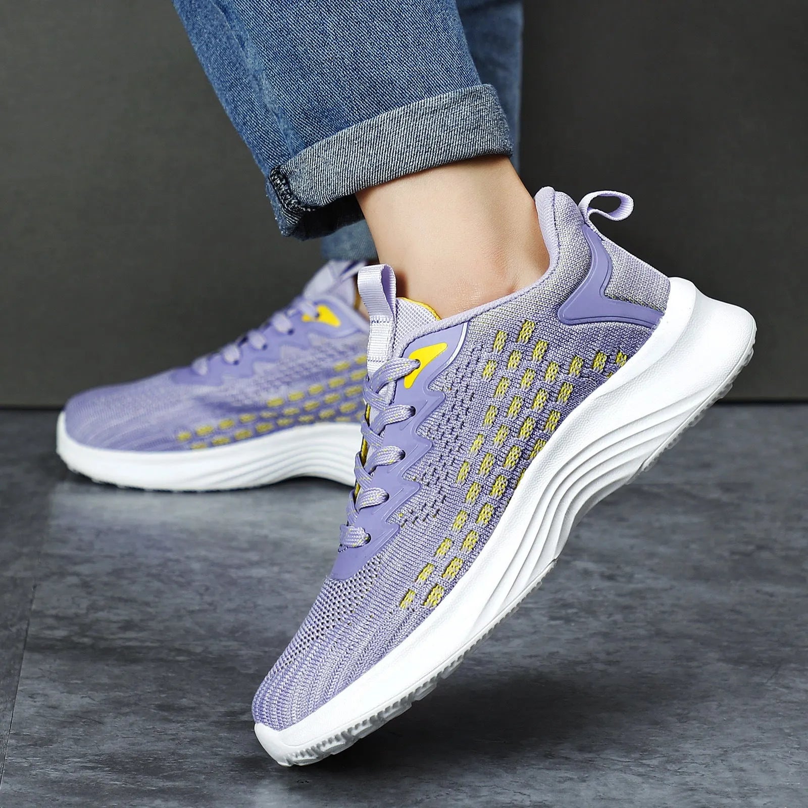 Women's Lavender Purple Flyknit running shoes with striped pattern and mesh upper on EVA sole.