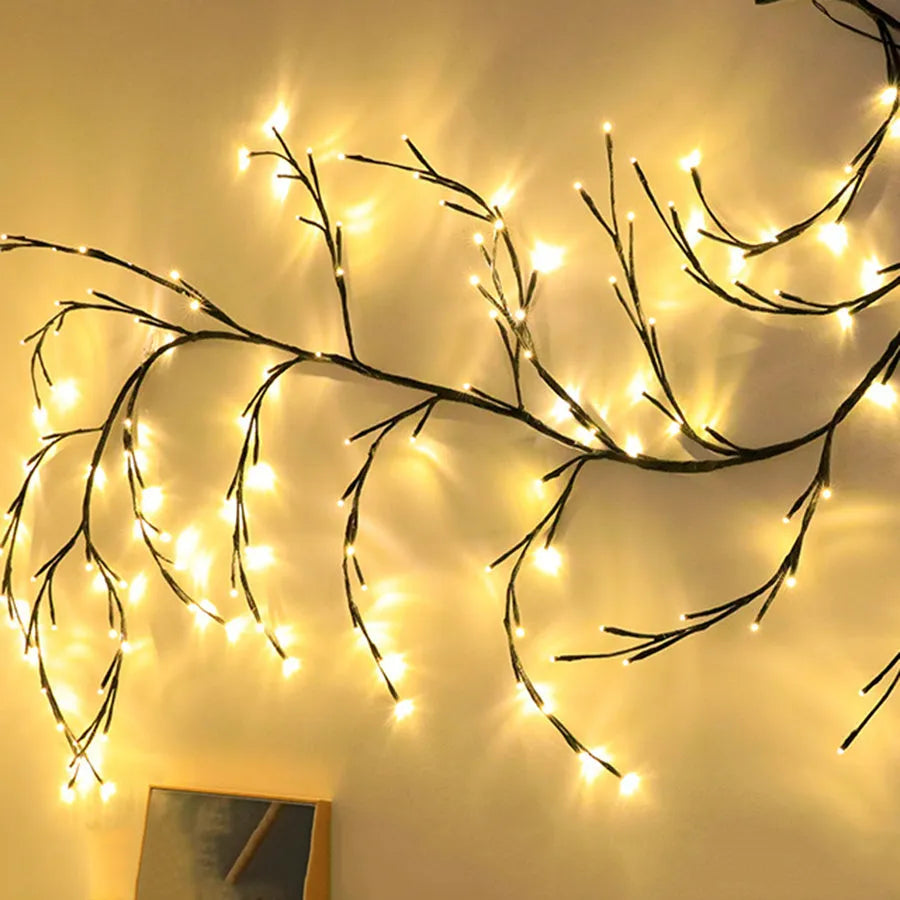 Flexible LED Christmas garland with vine branches and warm white lights for wall decoration