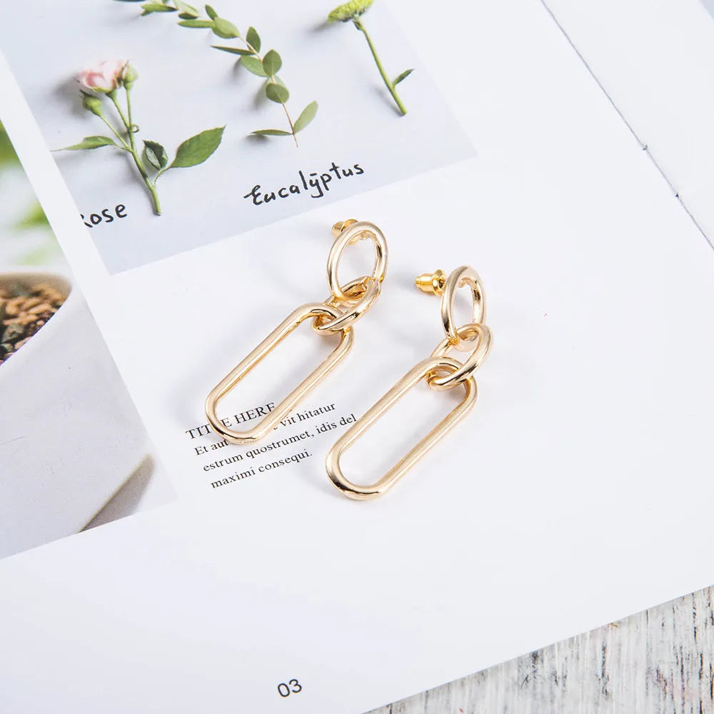 Sterling silver needle geometric hoop earrings with ring and line design on alloy base
