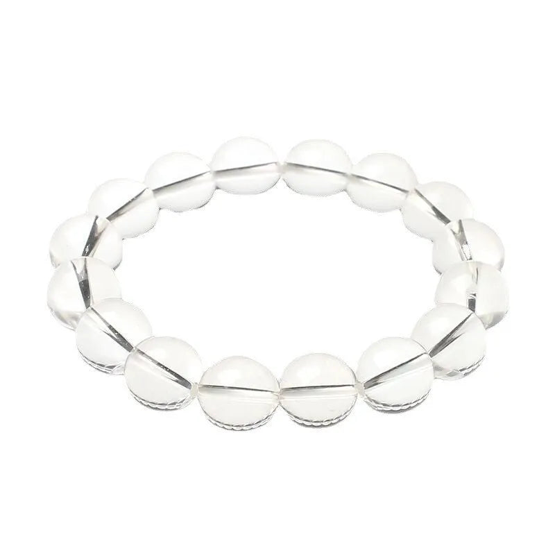 Natural Donghai Old Mine white crystal round bead bracelet on a wrist, showing geometric single strand design.