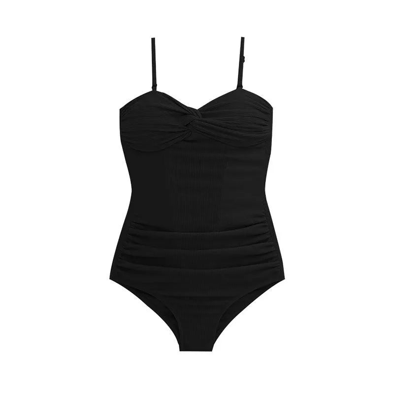 Women's solid colour one-piece swimsuit with suspender straps and a high-waist slimming design.