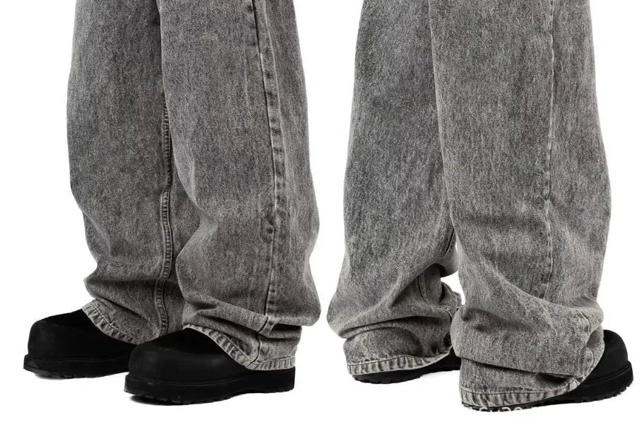 Grey loose straight-leg denim trousers for men and women with mid-waist design