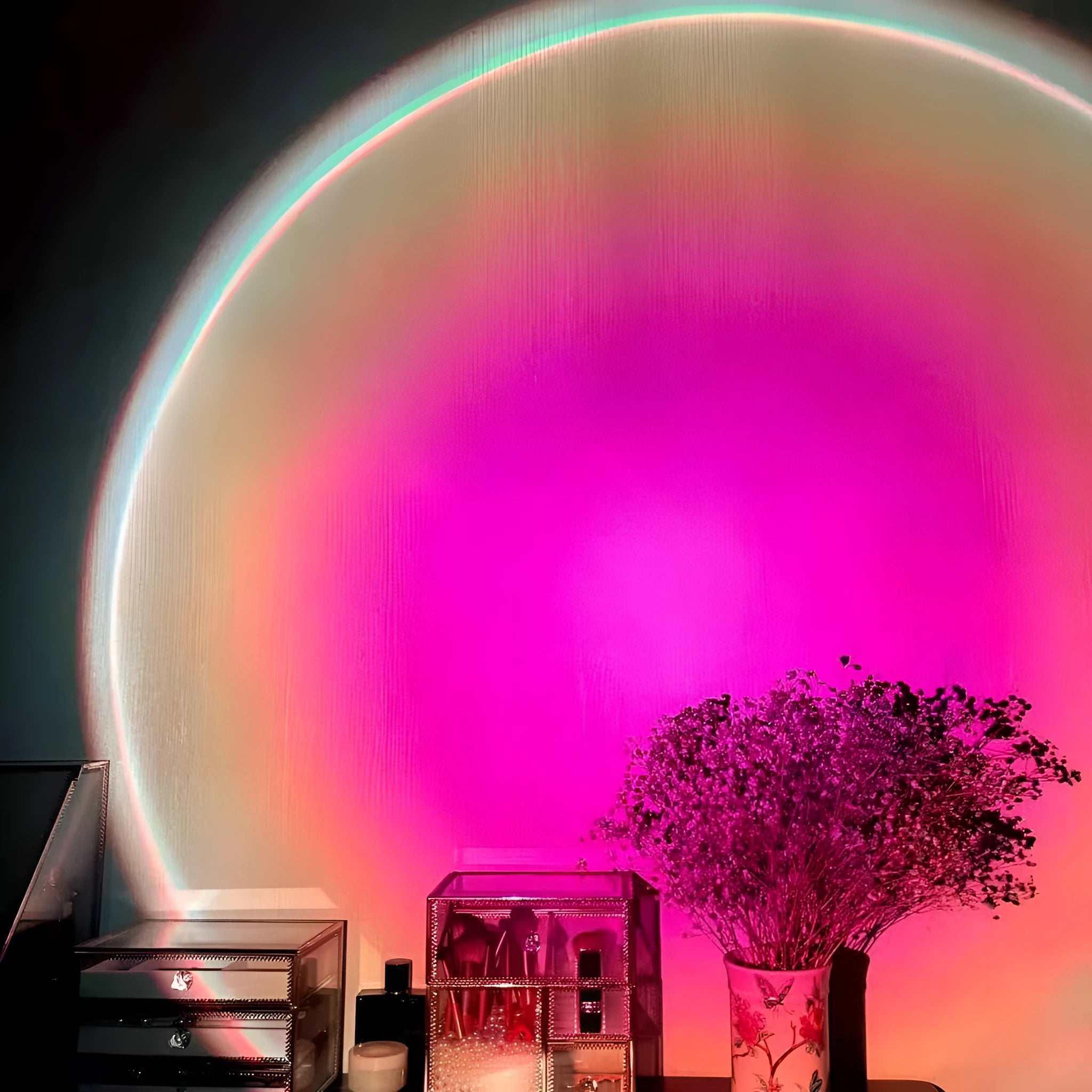 Rechargeable sunset red and rainbow projection lamp with USB cable and push-button switch.