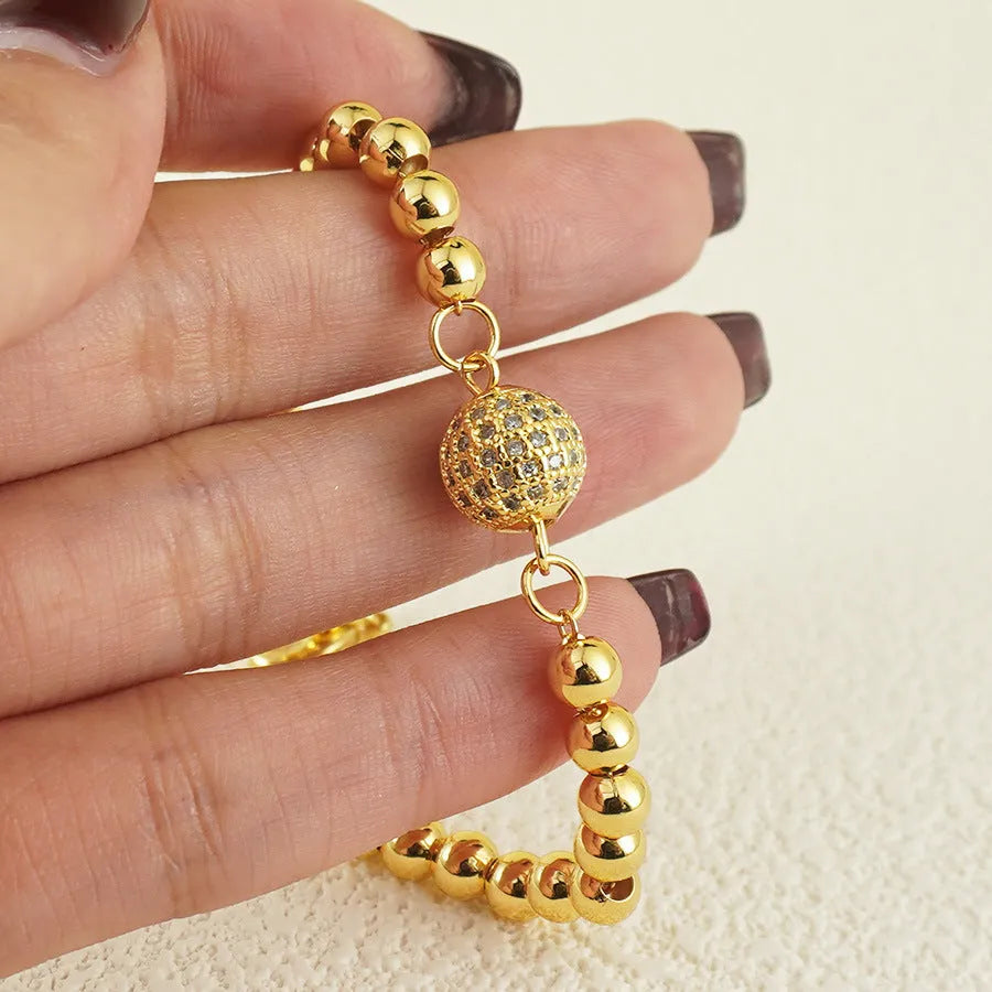 Women's copper bracelet with zircon stones in Arabic style featuring heart shape design