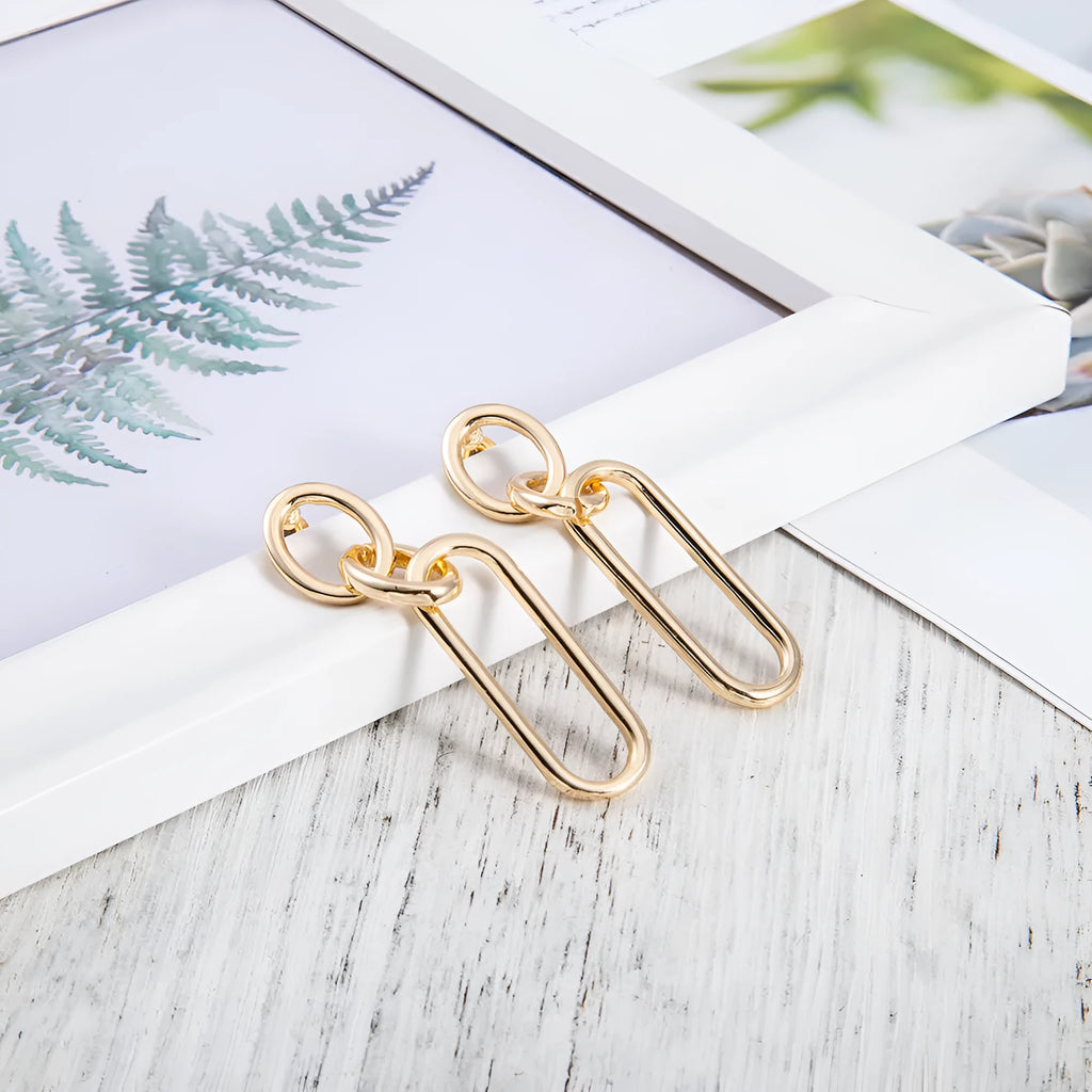 Sterling silver needle geometric hoop earrings with ring and line design on alloy base
