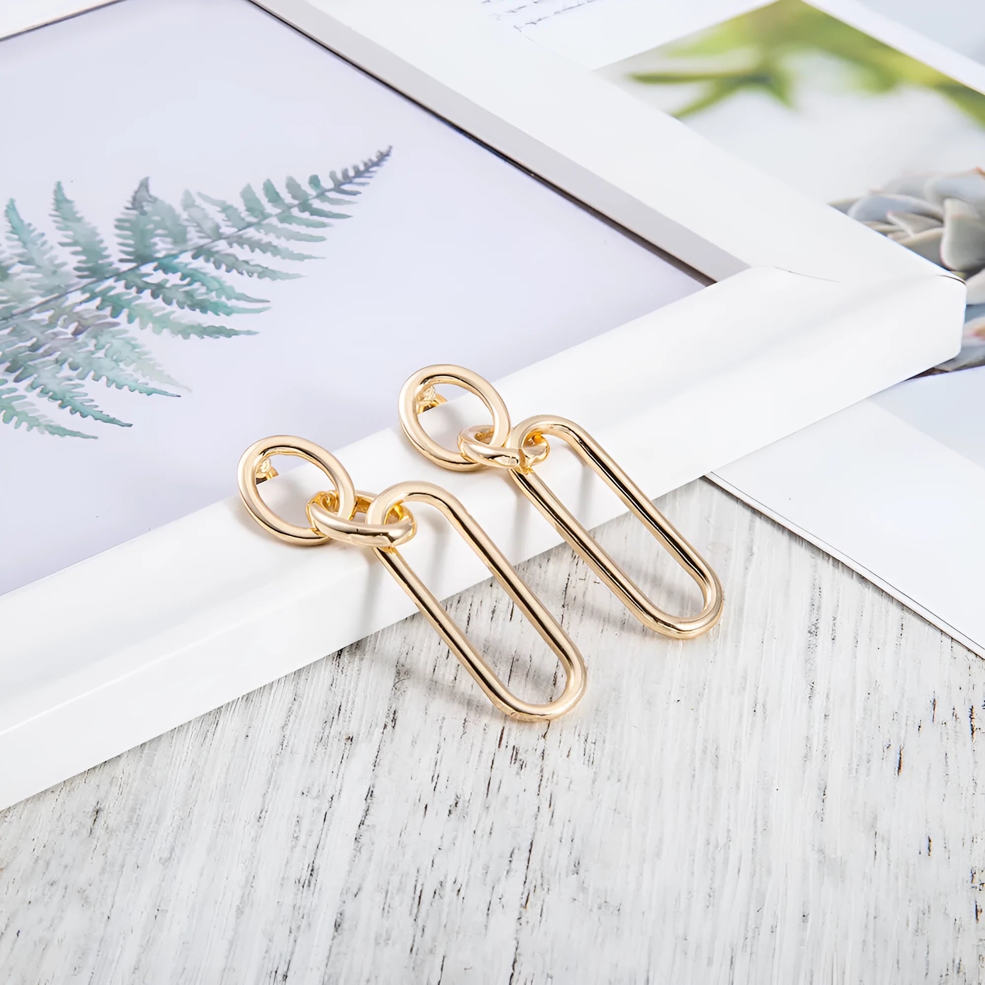 Sterling silver needle geometric hoop earrings with ring and line design on alloy base