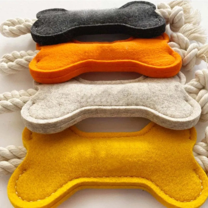 Bone-shaped dog chew toy with rope knot and felt construction in four colour options