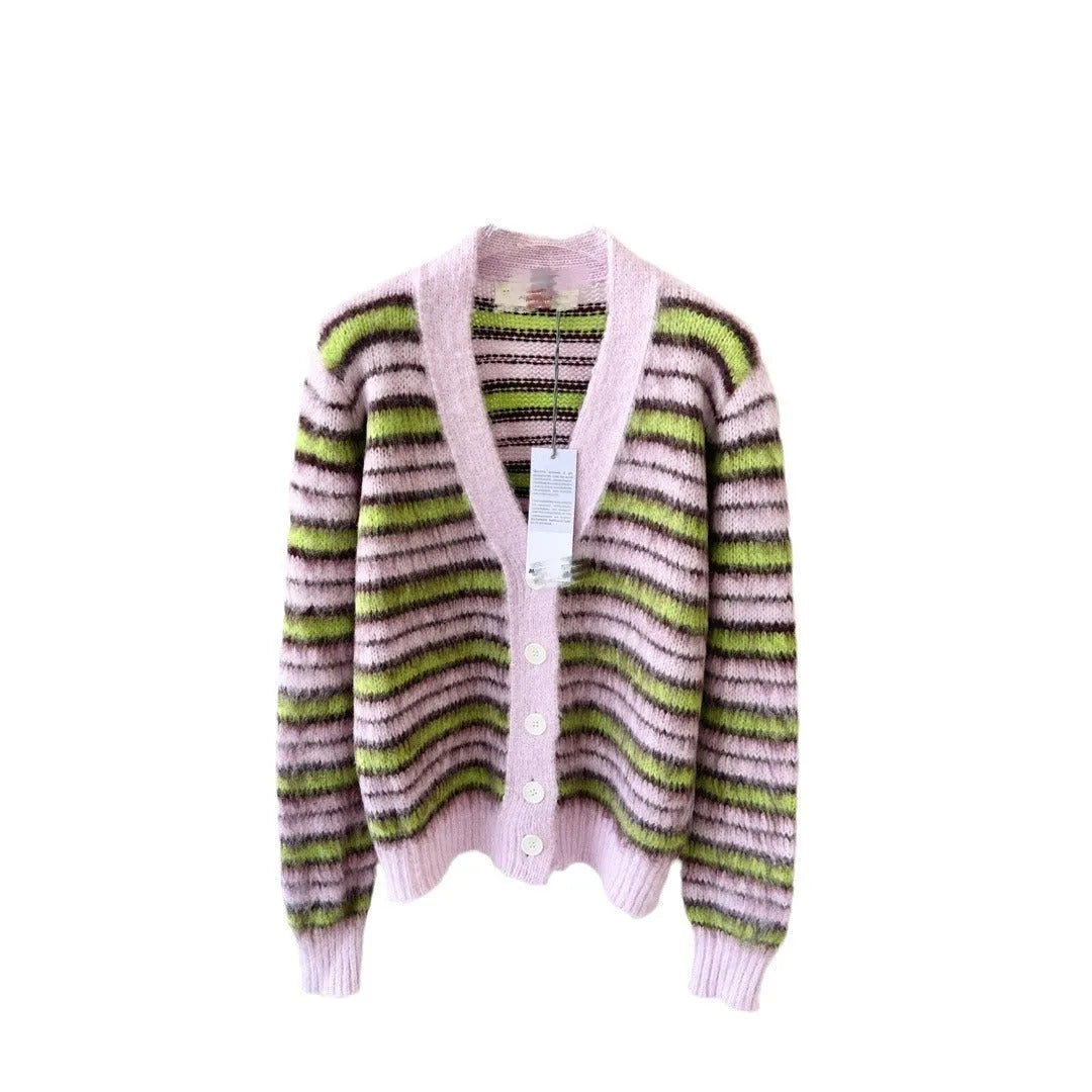 Pink women's wool knitted cardigan on a hanger, showing nap texture and regular sleeves.
