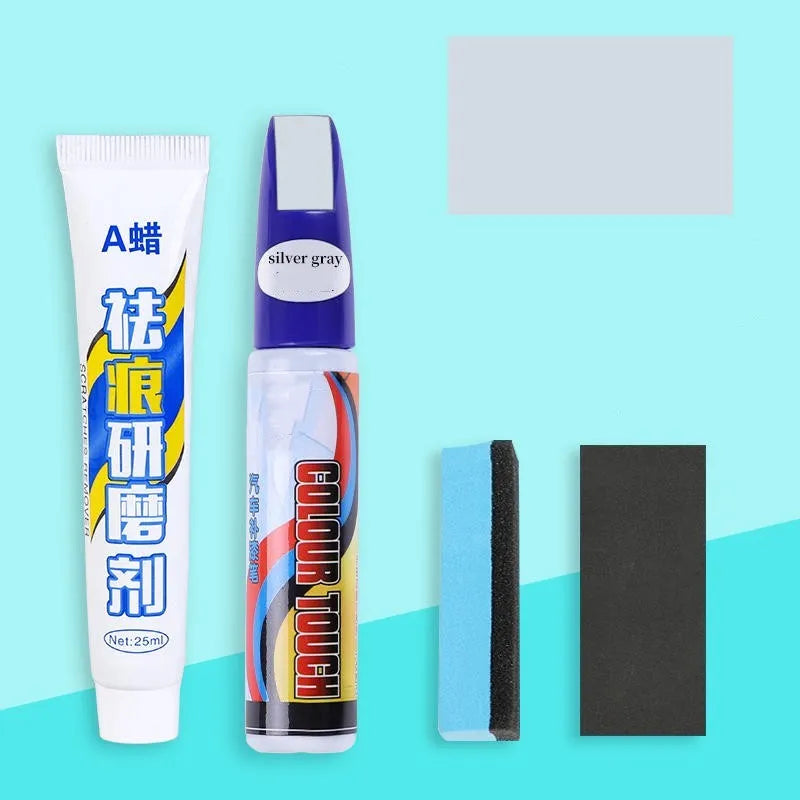 Automotive scratch repair kit with paint pen, wax tube, sponge, and sandpaper for DIY car paint touch-up.