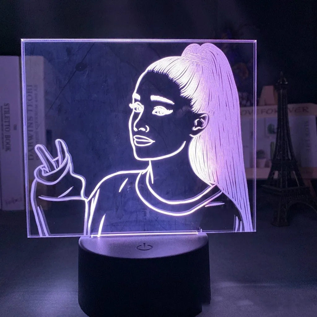 Slim white acrylic 3D decorative night light with LED illumination and remote control on a table.