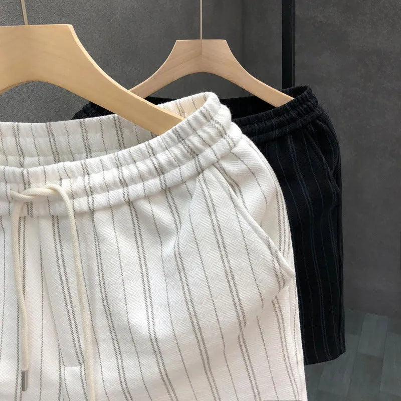 Men's black and white striped casual shorts with micro-elastic fabric and double-layer waistband