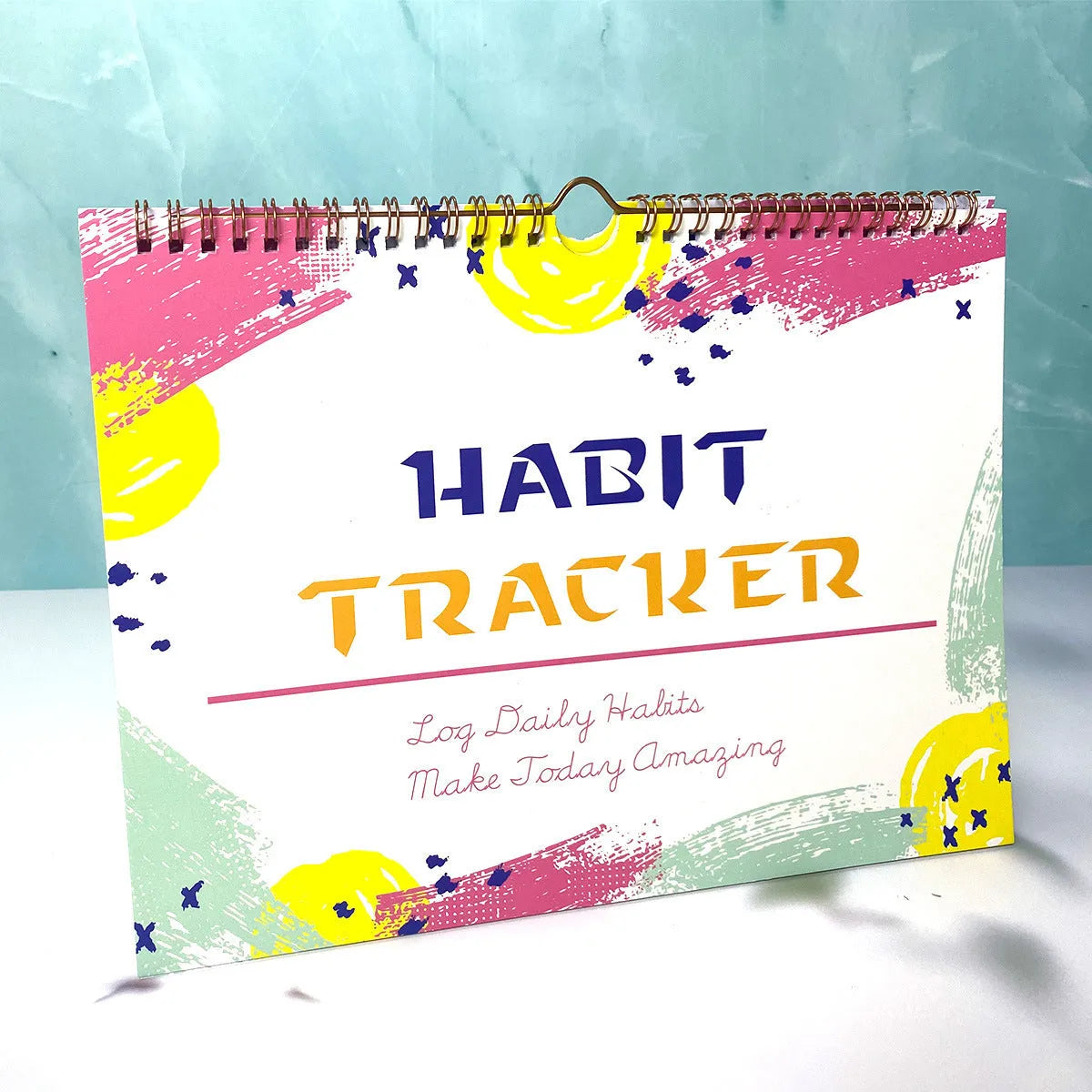 English habit tracking journal with 12 pages in 21cm by 28cm size