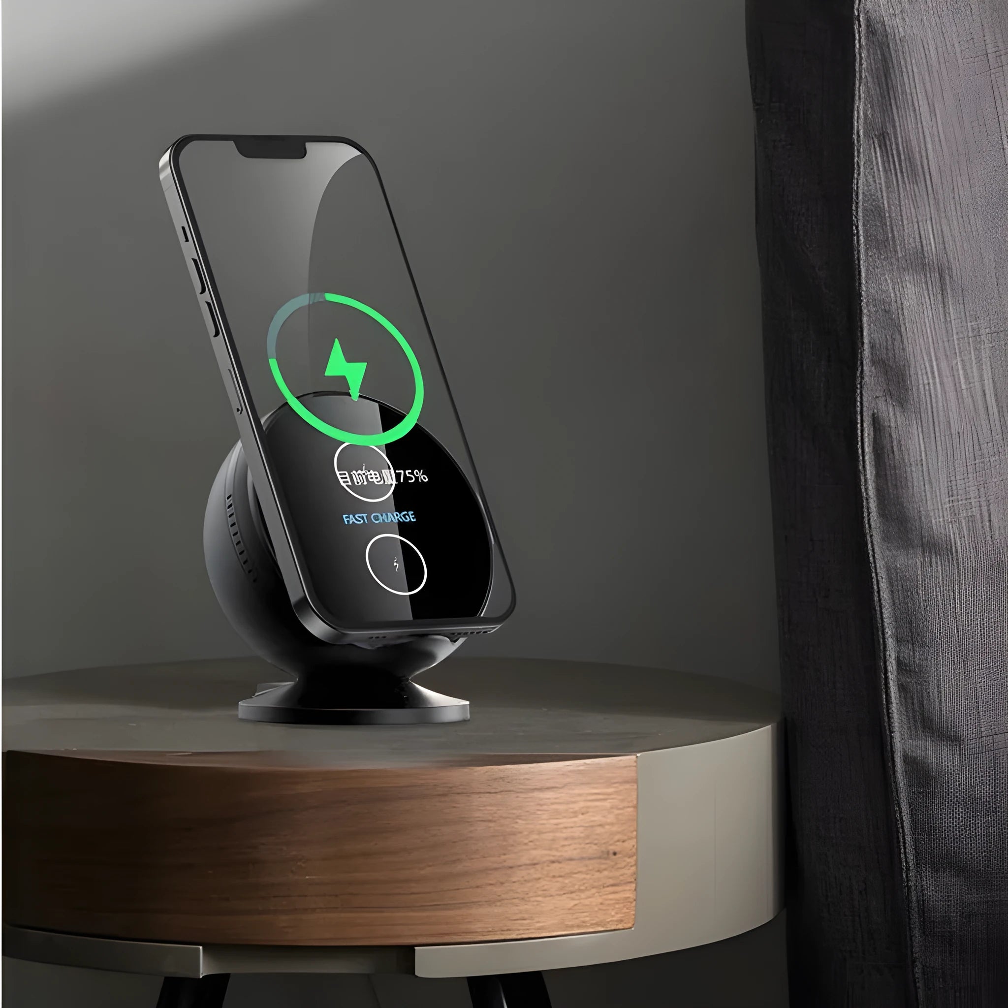 XC-11 black mobile phone wireless charger holder with integrated Bluetooth speaker on a desk.