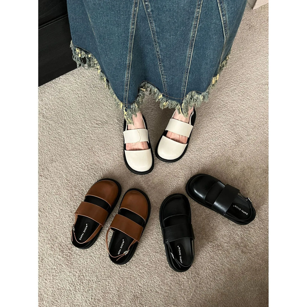 Retro raised bottom sandals with closed toe and ankle strap buckle in apricot colour