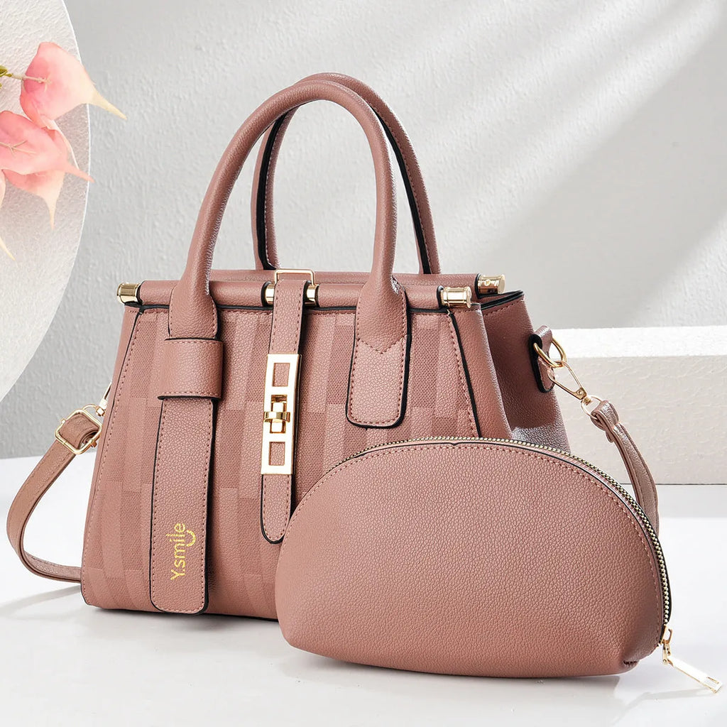 Round women's crossbody handbag in PU leather, shown in light khaki colour with a structured suitcase shape.
