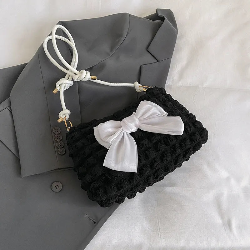 Women's canvas single-shoulder handbag in horizontal square shape with internal mobile phone pocket