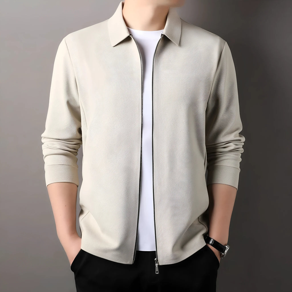 Men's apricot-coloured polyester business jacket with long sleeves and a straight hem on a hanger.