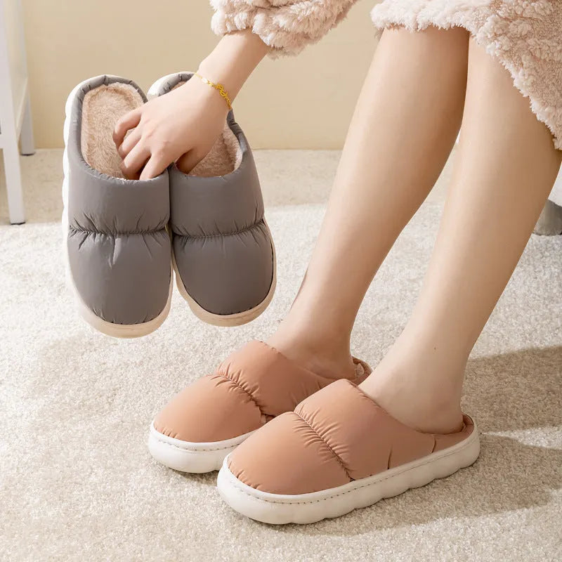 Down cotton slippers with artificial leather upper, rubber sole and plush lining in multiple colours