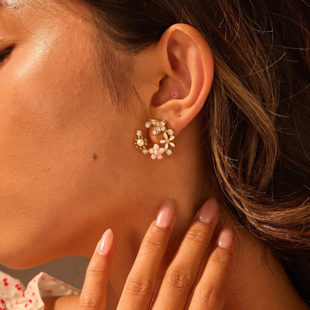 Gold plated flower stud earrings with petal design on stainless steel base