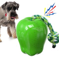 Green apple-shaped plastic dog toy with food dropping ball for interactive feeding and dental chewing