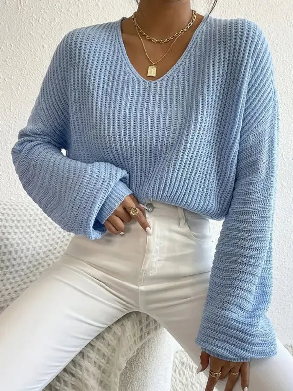 Women's long sleeve pullover in solid colour with loose casual fit and threads decorative element