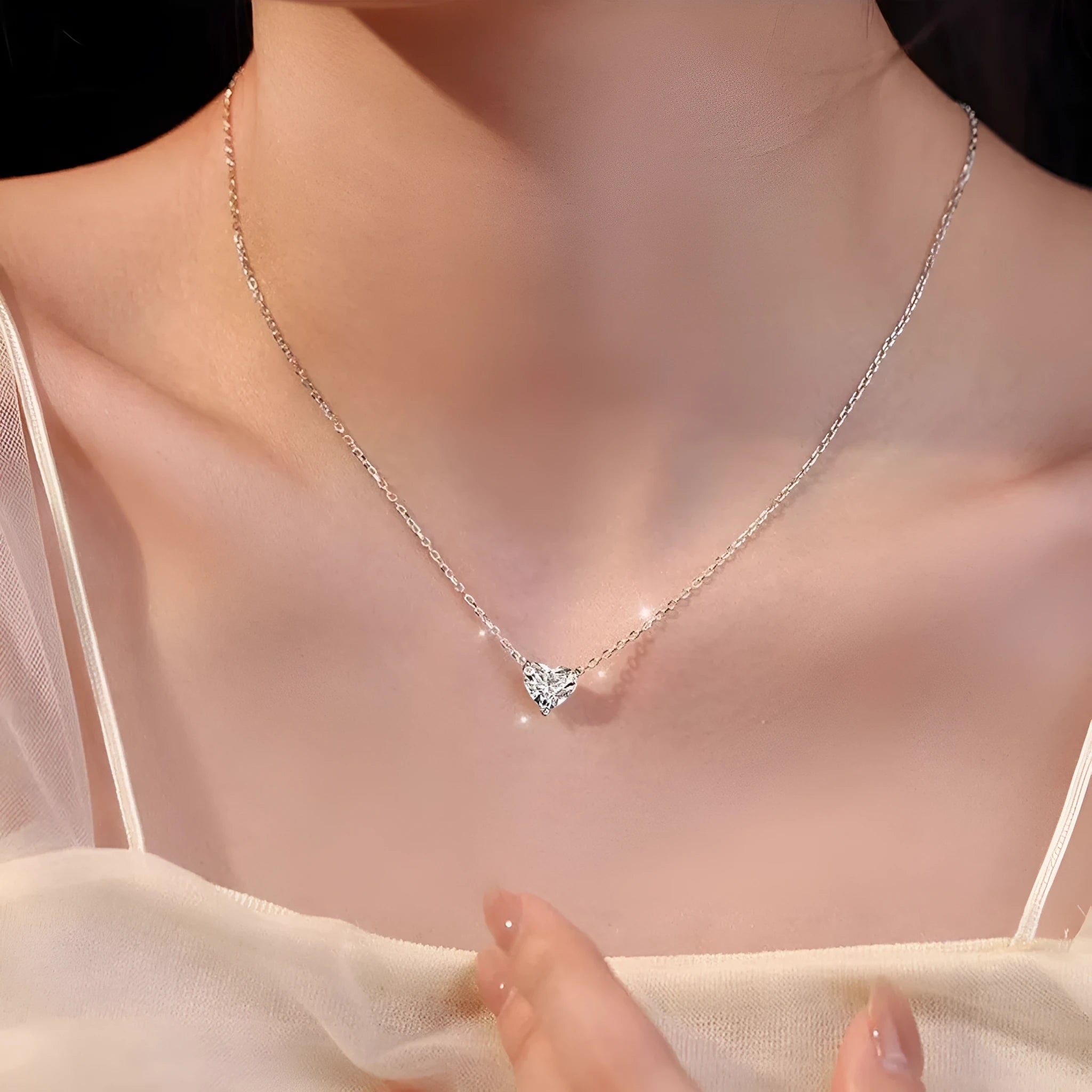 Women's copper necklace with heart-shaped pendant and polished silver finish