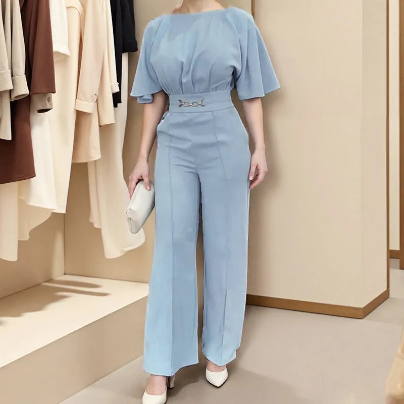 Blue men's polyester suit with trousers and long-sleeved shirt on hanger