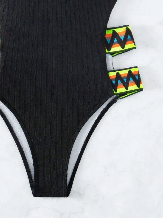 Women's solid colour one-piece swimming suit in black or orange options